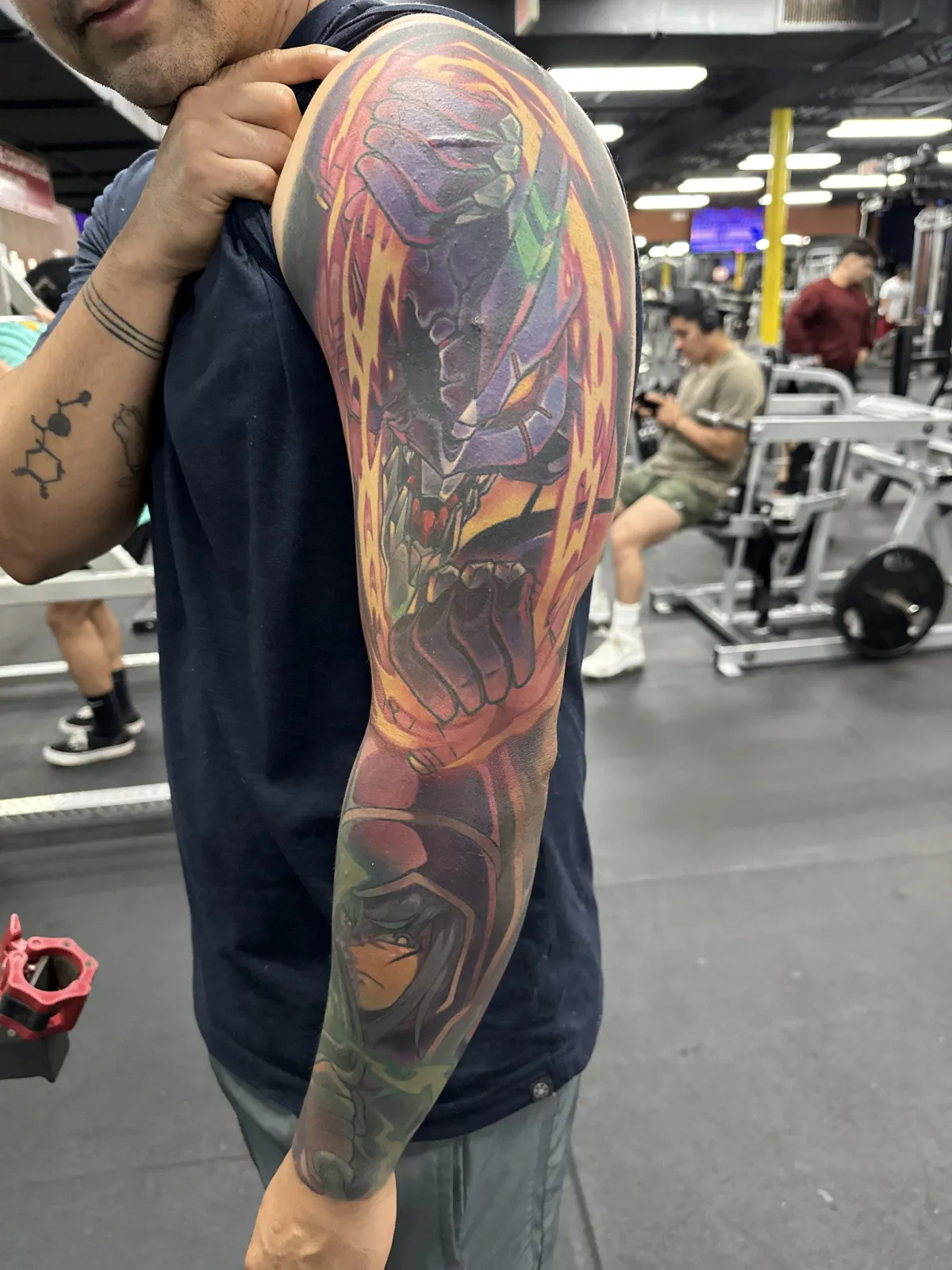 Fully healed anime tattoo of Eva Unit 01 from Evangelion by Orlando Anime Tattoo Artist Ren Behan. This Evangelion Tattoo is stunning is composition and rich in color.