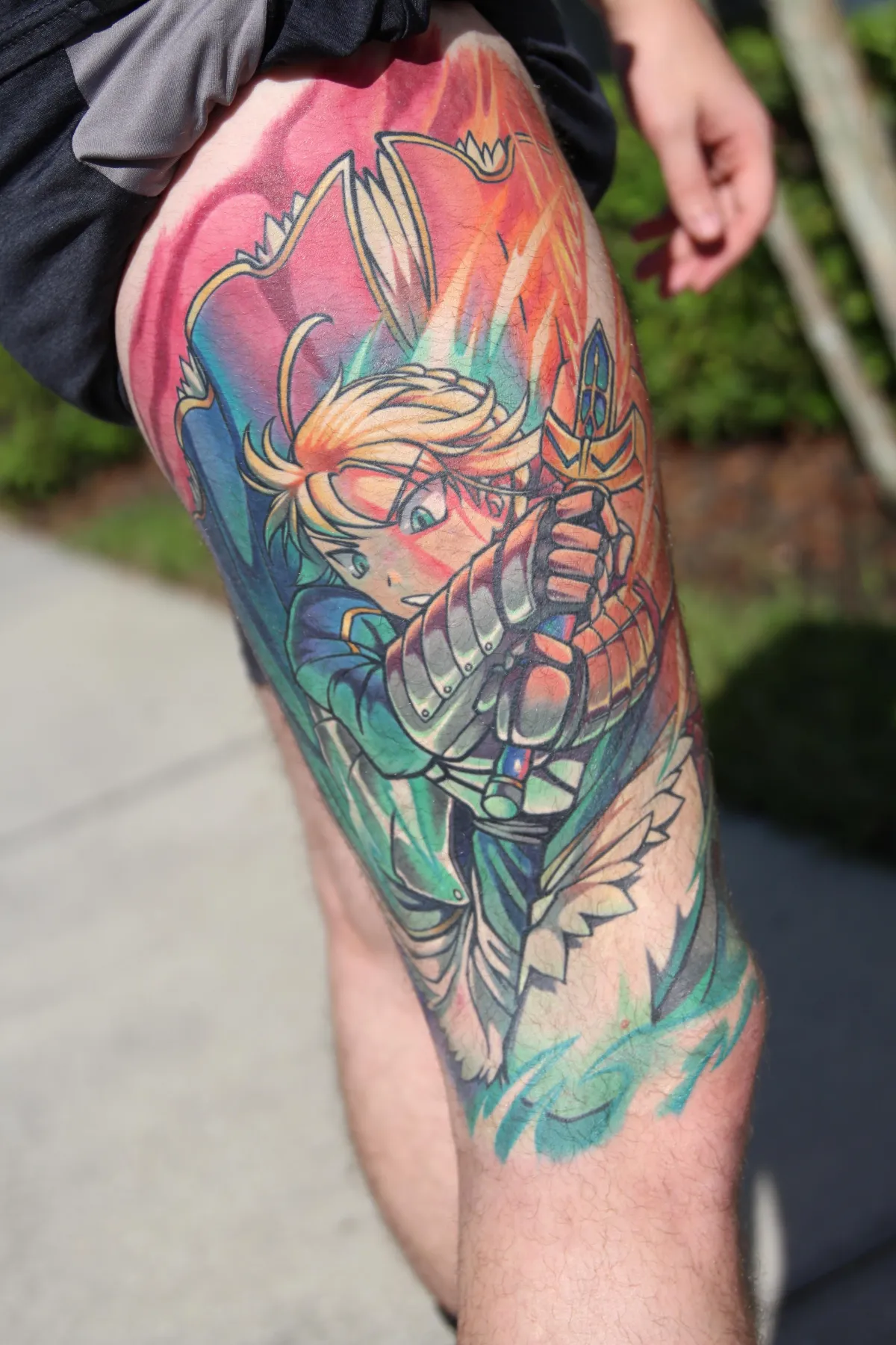 Fully healed anime tattoo of Saber from Fate/Stay night by Orlando Anime Tattoo Artist Ren Behan. This Fate/Stay Night tattoo is prismatic in color and crisp in detail.
