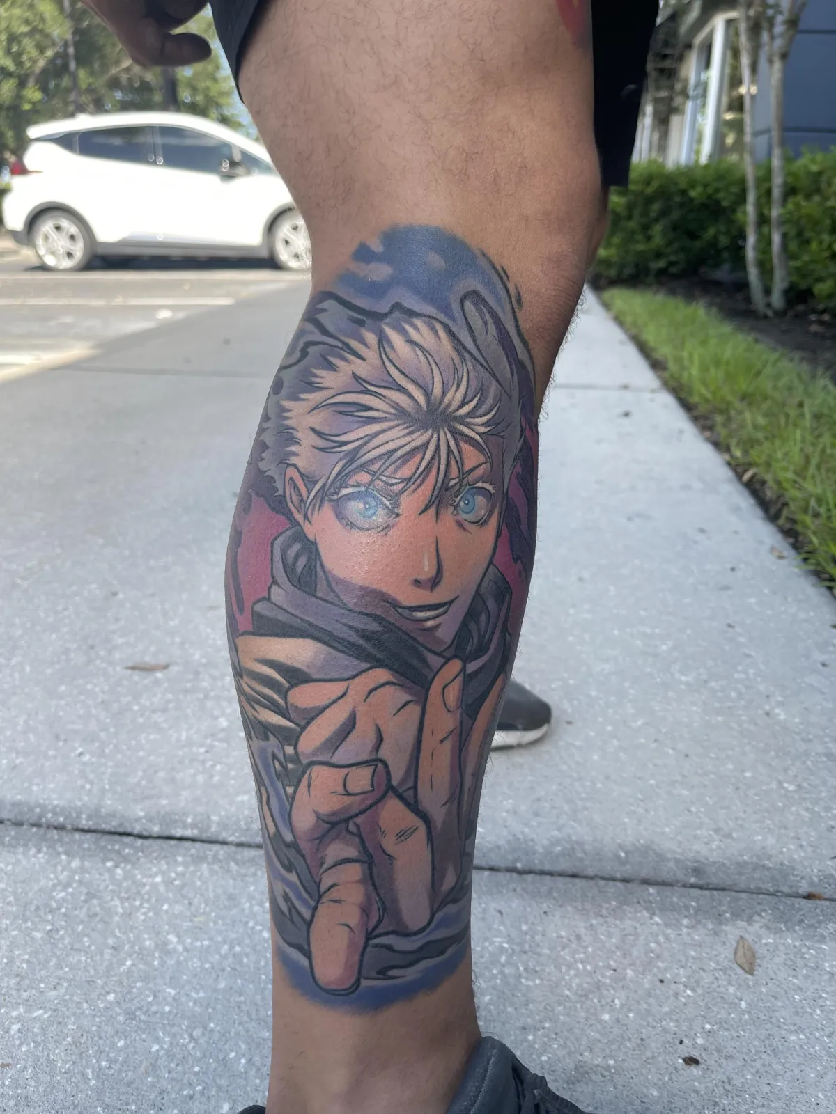 Fully healed anime tattoo of Gojo from JJK. This Gojo tattoo is fully healed and the colors remain bright.