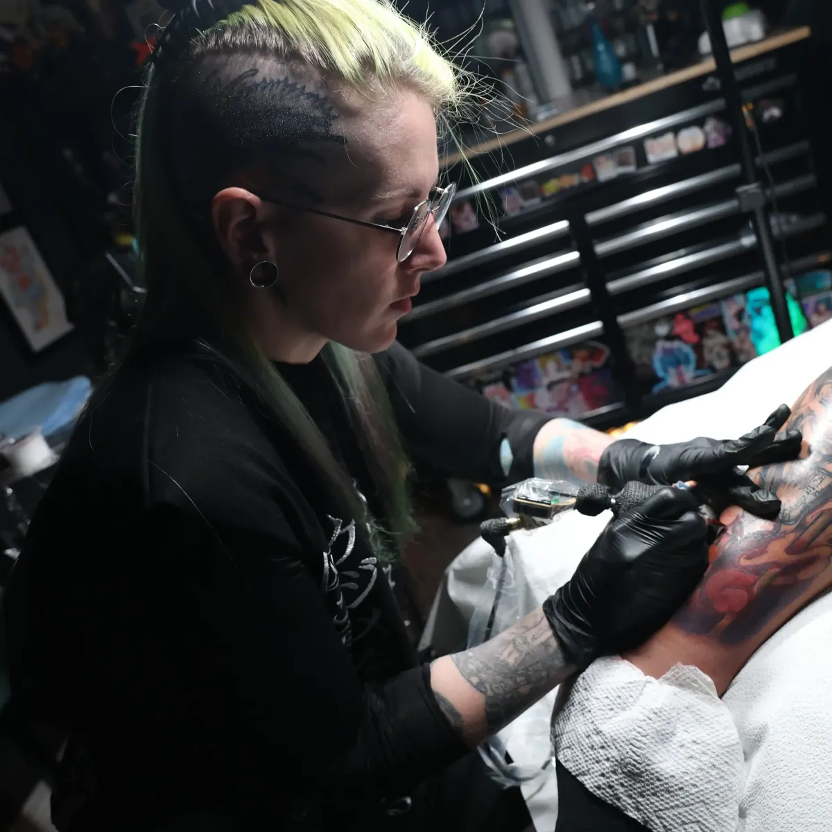 A color anime tattoo of Aki Hayakawa and the Future Devil from Chainsaw Man, featuring bold shading, eerie contrast, and intricate linework that captures their ominous presence. Designed by Ren Behan, a top anime tattoo artist in Orlando, Florida. This chainsaw man tattoo features vibrant colors in a unique composition - perfect for fans of anime and manga.
