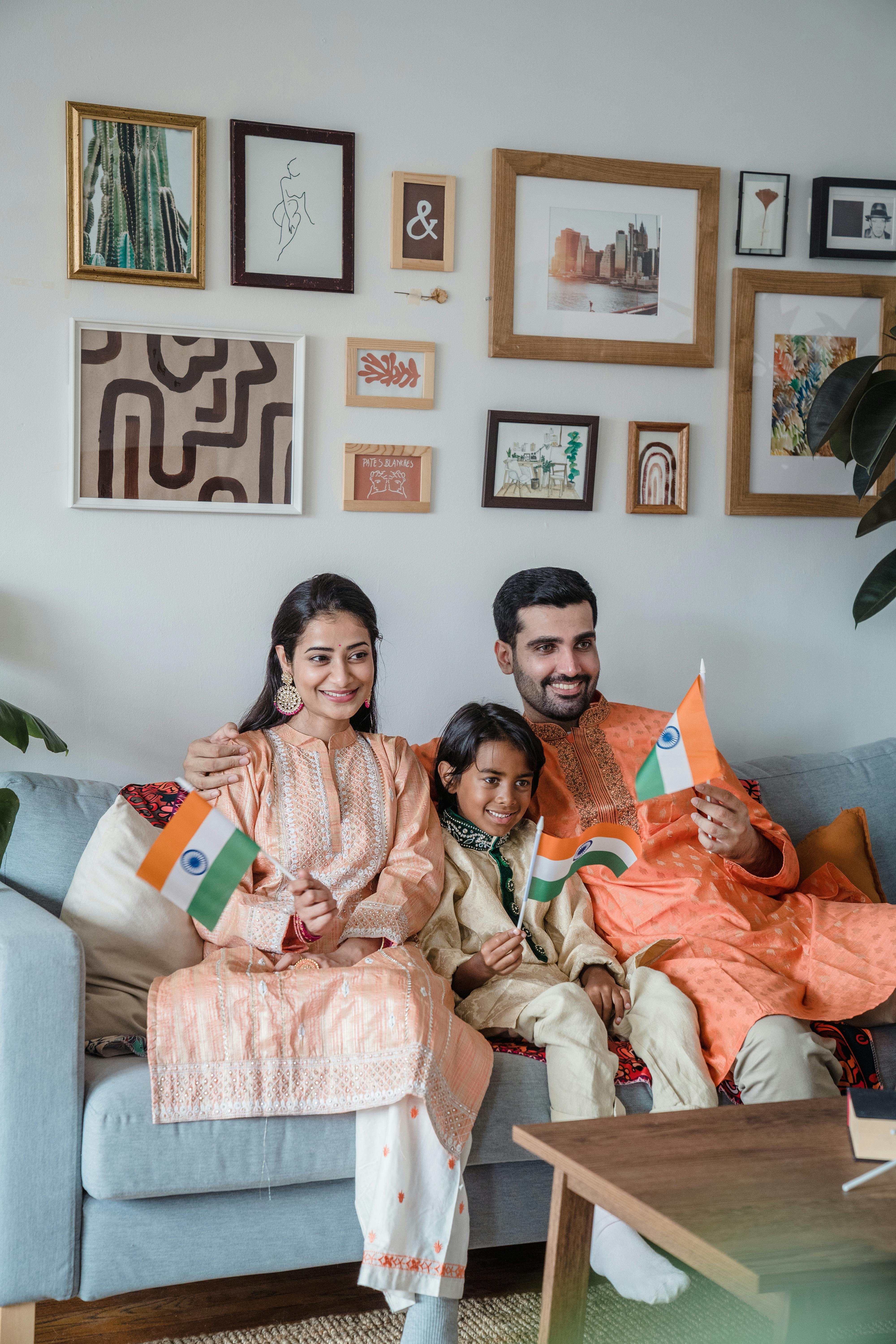 Professional financial consultant with a happy Indian family