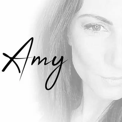 This Is A Closeup Of Amy With Her Name In Cursive Writing