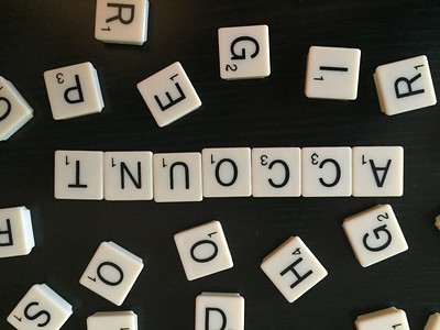 a group of white square letters on a black surface