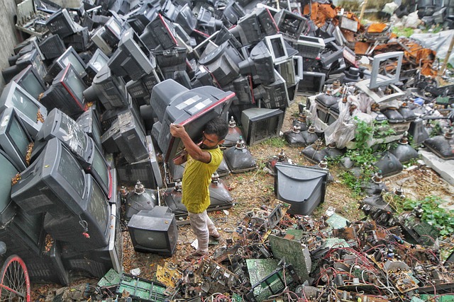 a person carrying a television