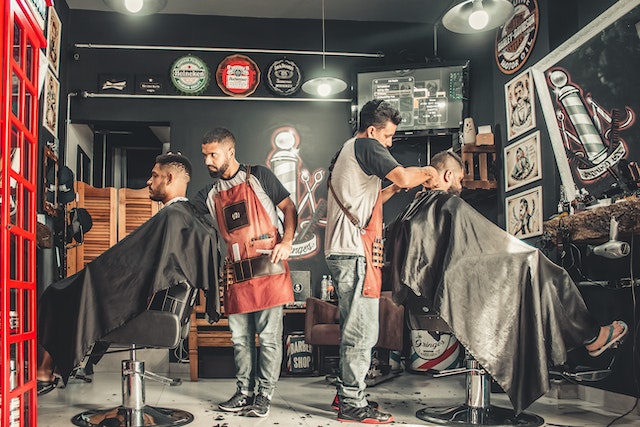 a group of men in a barber shop