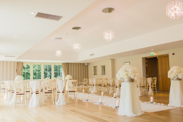 a room with chairs and tables and chairs