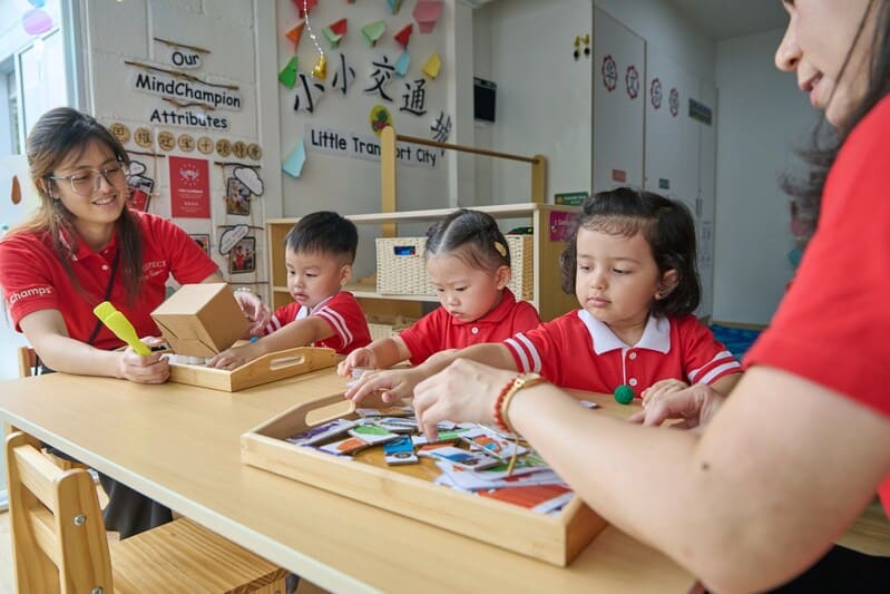 Preschool child joyfully exploring rhythmic dance and creative expression with props