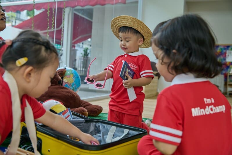 Preschool child joyfully exploring rhythmic dance and creative expression with props