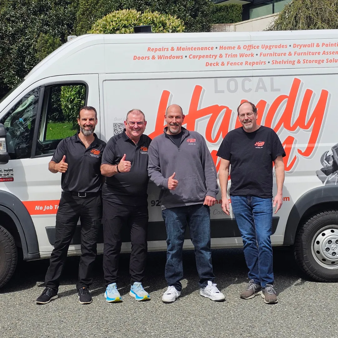 Vancouver Handyman franchise owner standing beside branded Local Handyman Group service vehicle.