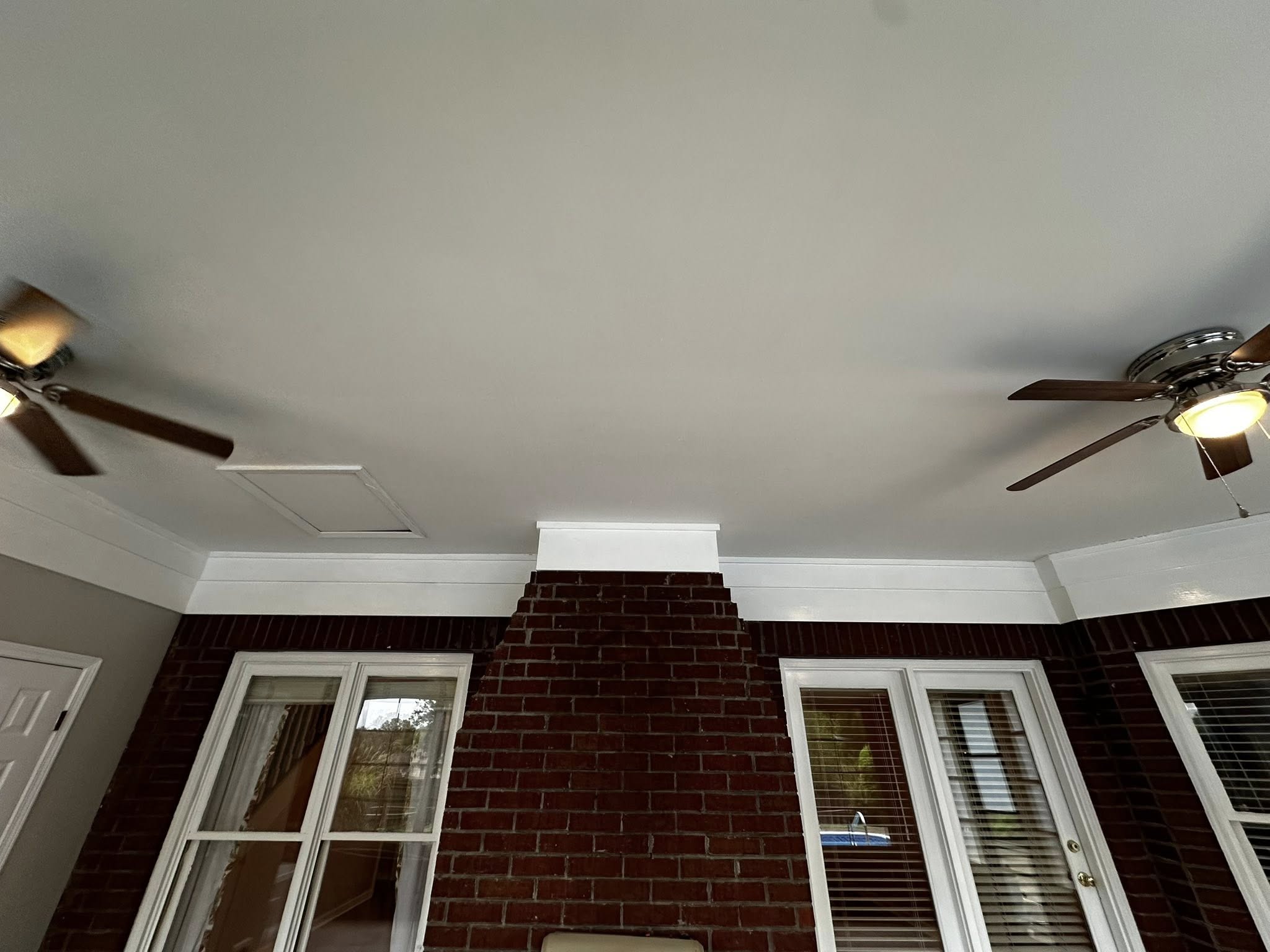 Photo showing freshly restored ceiling and trim above a brick porch area, illustrating the type of moisture-exposed exterior zones in Memphis where wood rot develops due to humidity and loess-soil drainage issues. Demonstrates Local Handyman Midsouth’s completed repair quality on older Bluff City homes.