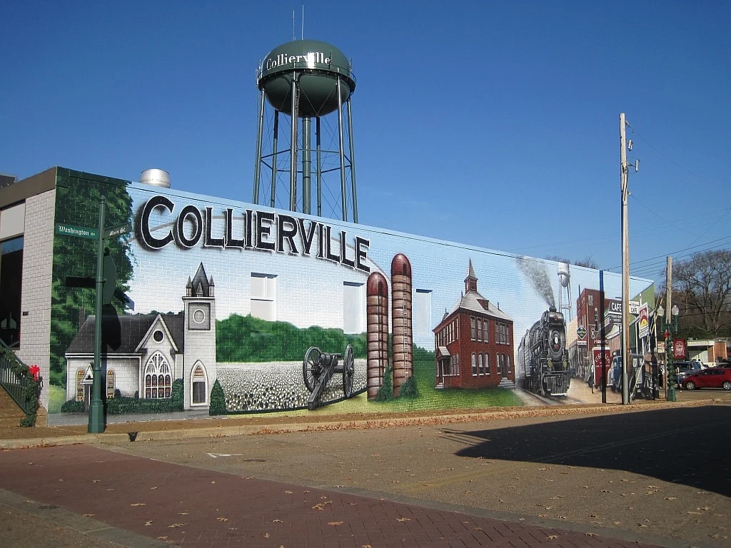 Collierville Tennessee mural and water tower in the town square, representing the local community served by professional handyman services.