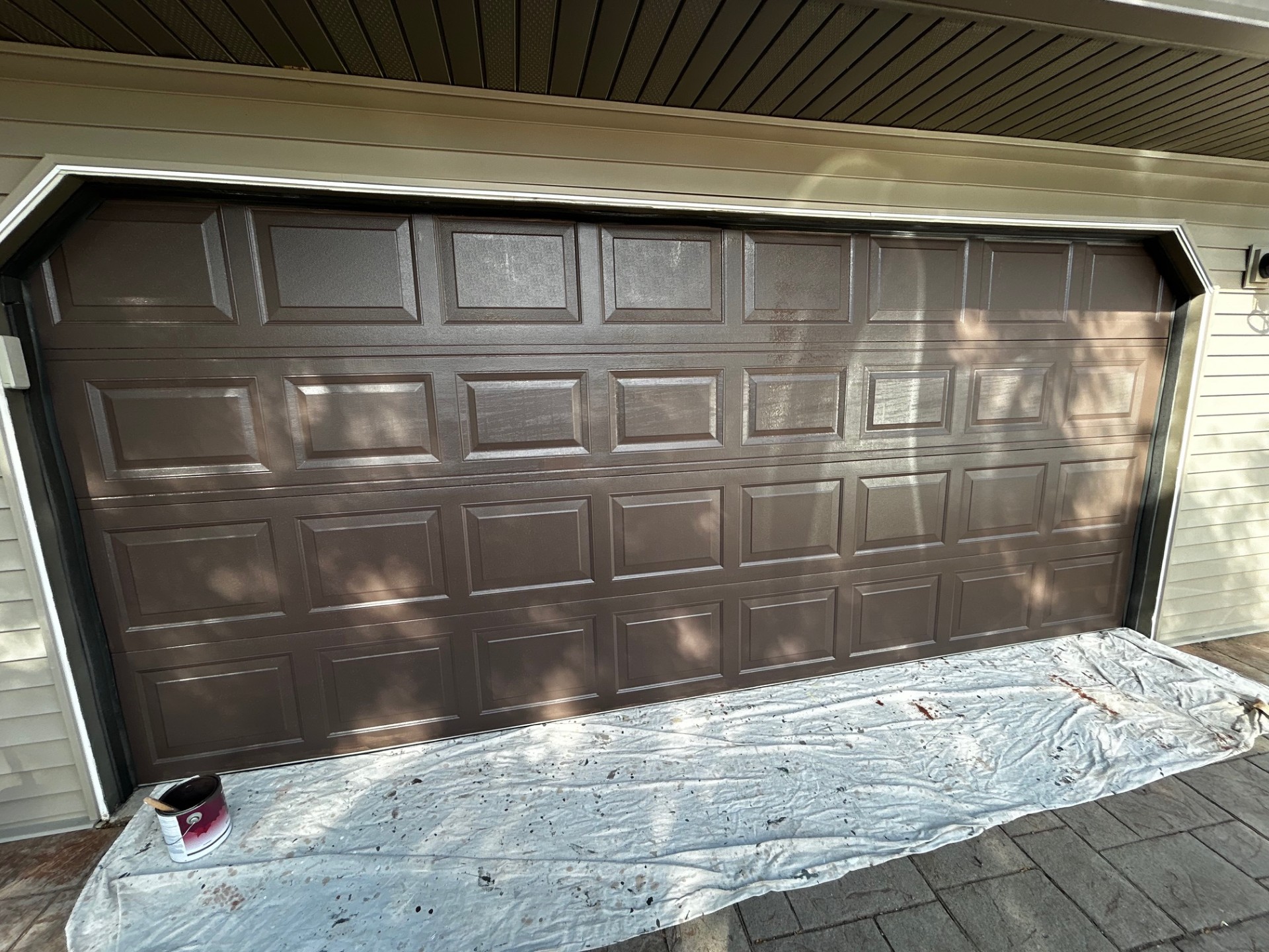 Exterior home repainted in coastal blue with white trim