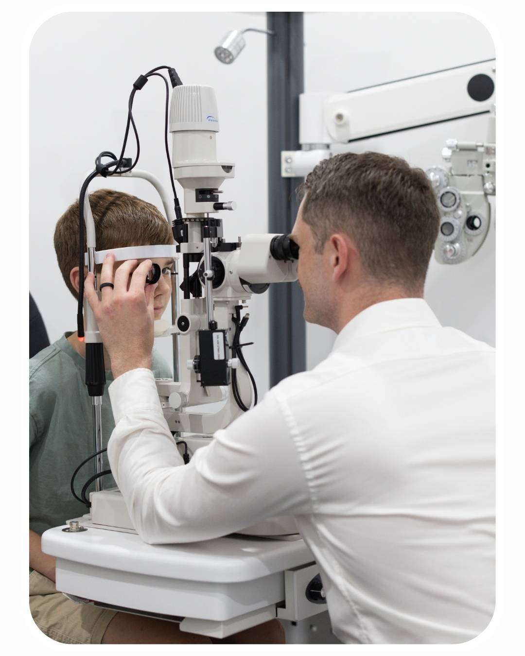 Optometrist performing an eye test at On Point Eyecare Mackay