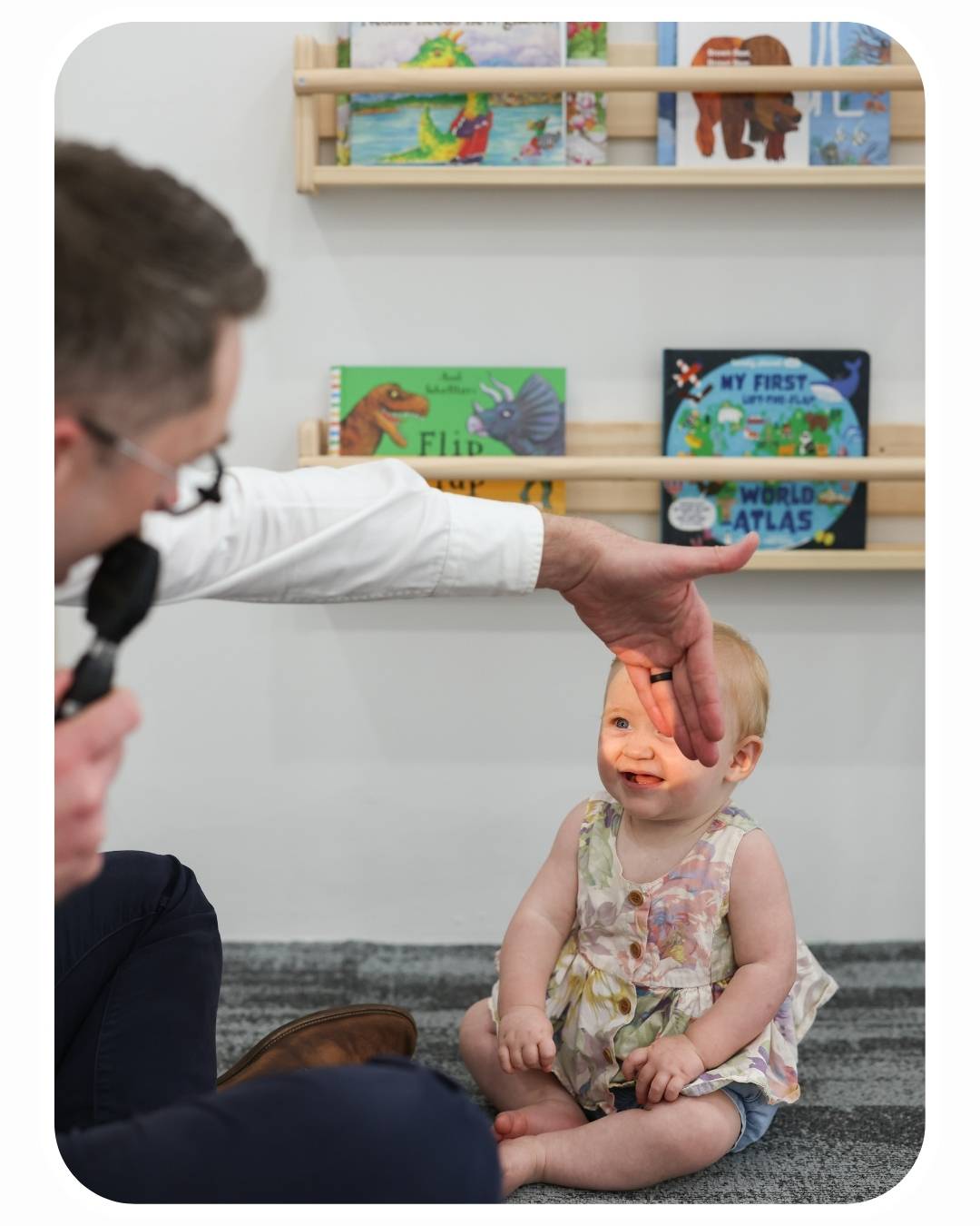 Optometrist performing a kids eye test at On Point Eyecare Mackay