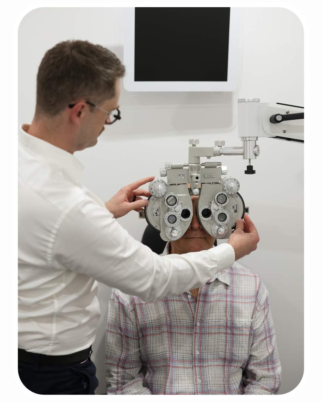 Optometrist performing a comprehensive vision assessment during a general eye examination at On Point Eyecare in Mackay