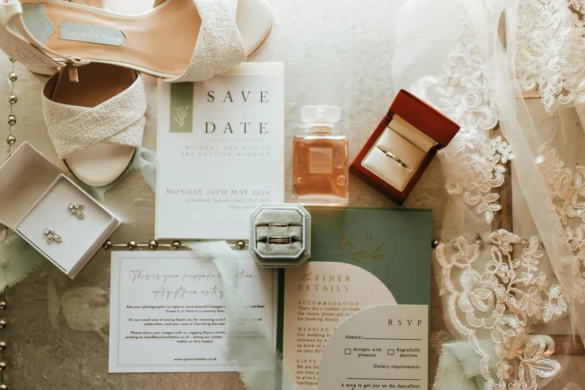 Relaxed wedding photographer taking photo of wedding details