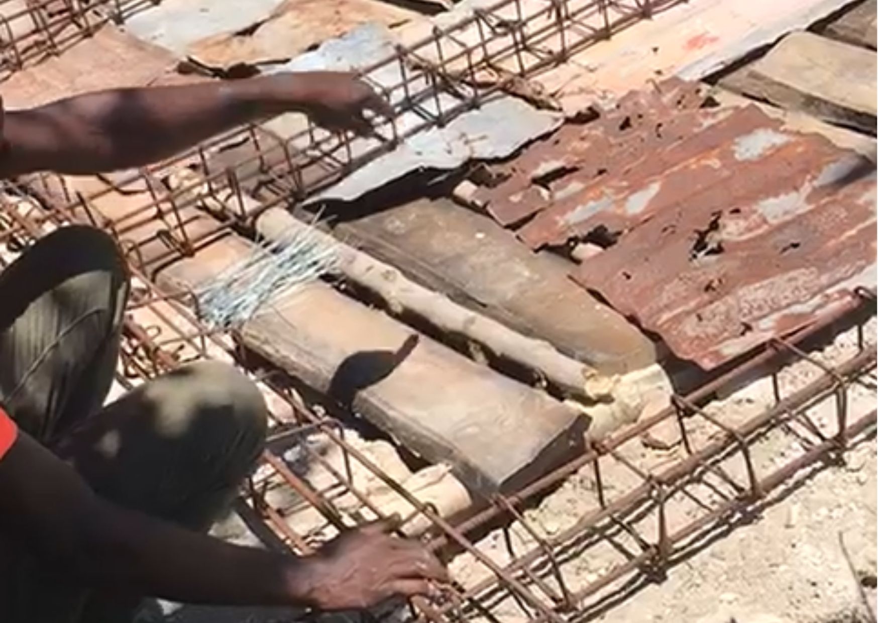 Community members work on a sustainable construction initiative through Boujonnen Foundation's Green Technology program, promoting environmental resilience, resource conservation, and stronger communities.