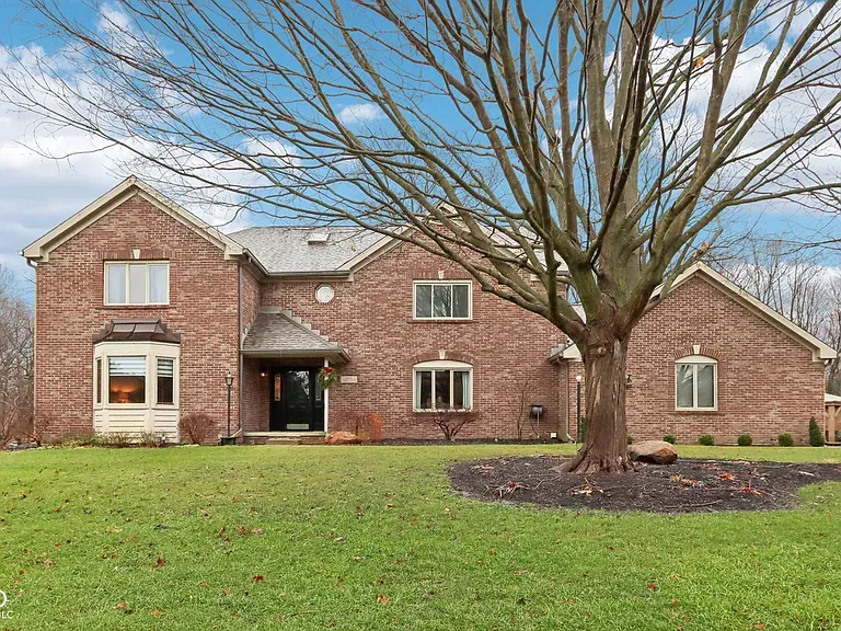 a rendering of a modern house with palm trees