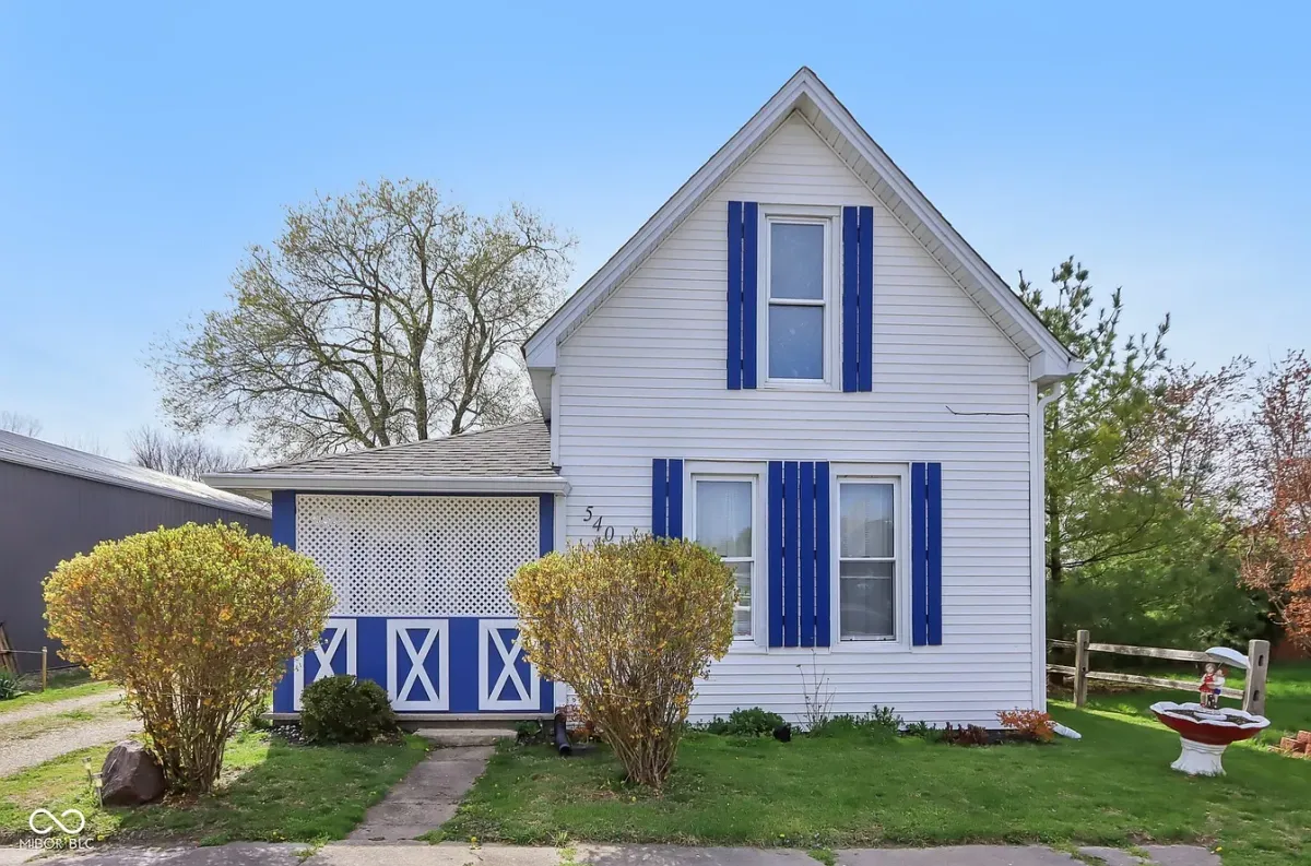 a rendering of a modern house with palm trees