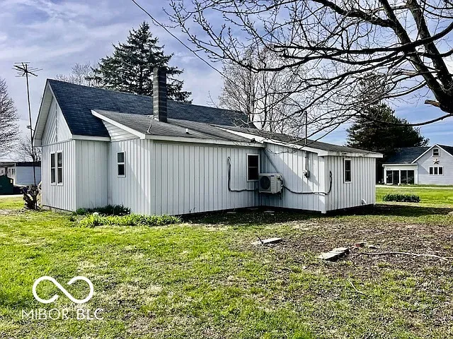 a rendering of a modern house with palm trees