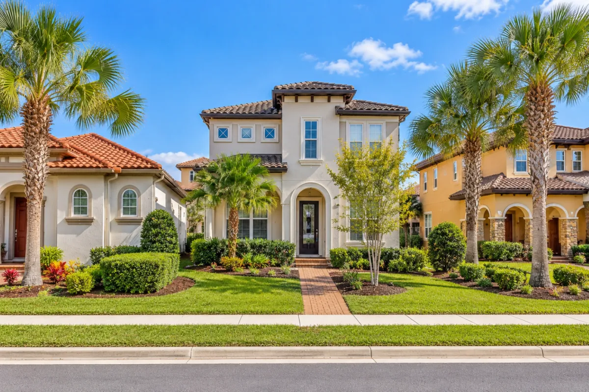 Mediterranean-style homes with stucco exteriors, tile roofs and varied architecture in Siena at Nocatee