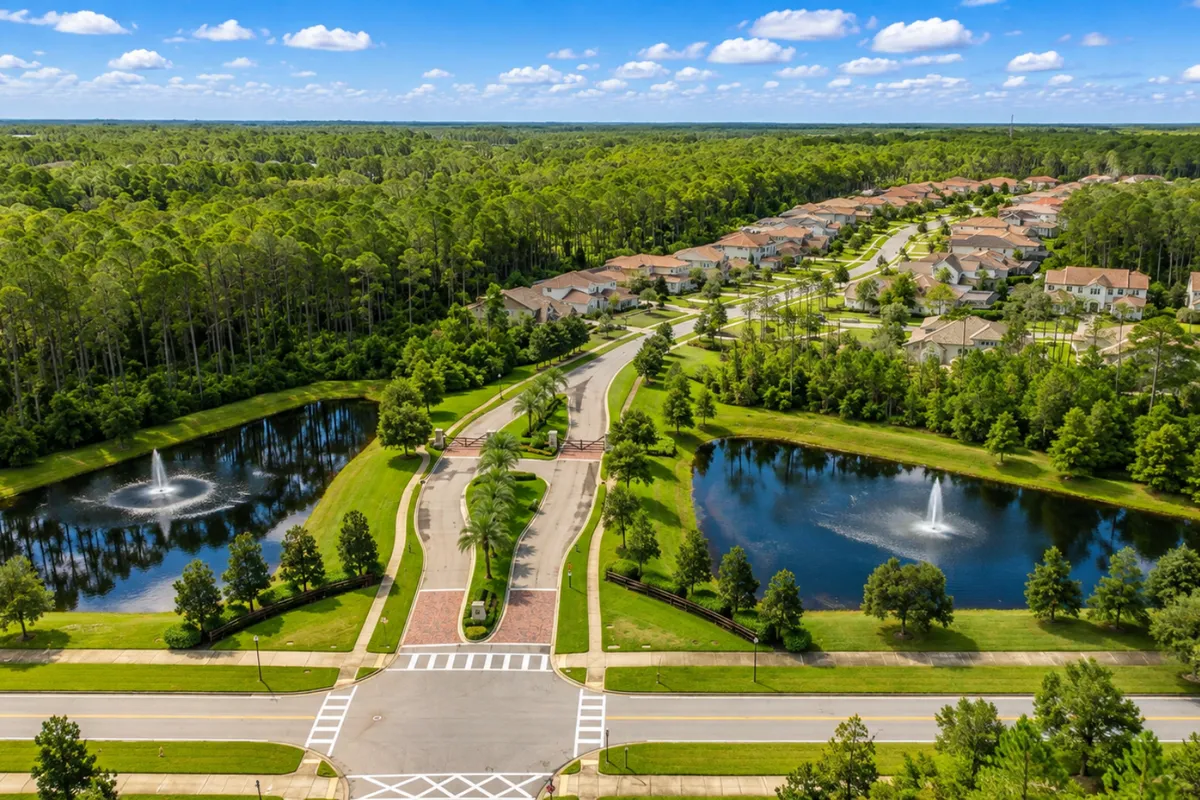 Aerial view of The Island at Twenty Mile showing homes, ponds and surrounding preserve in Nocatee
