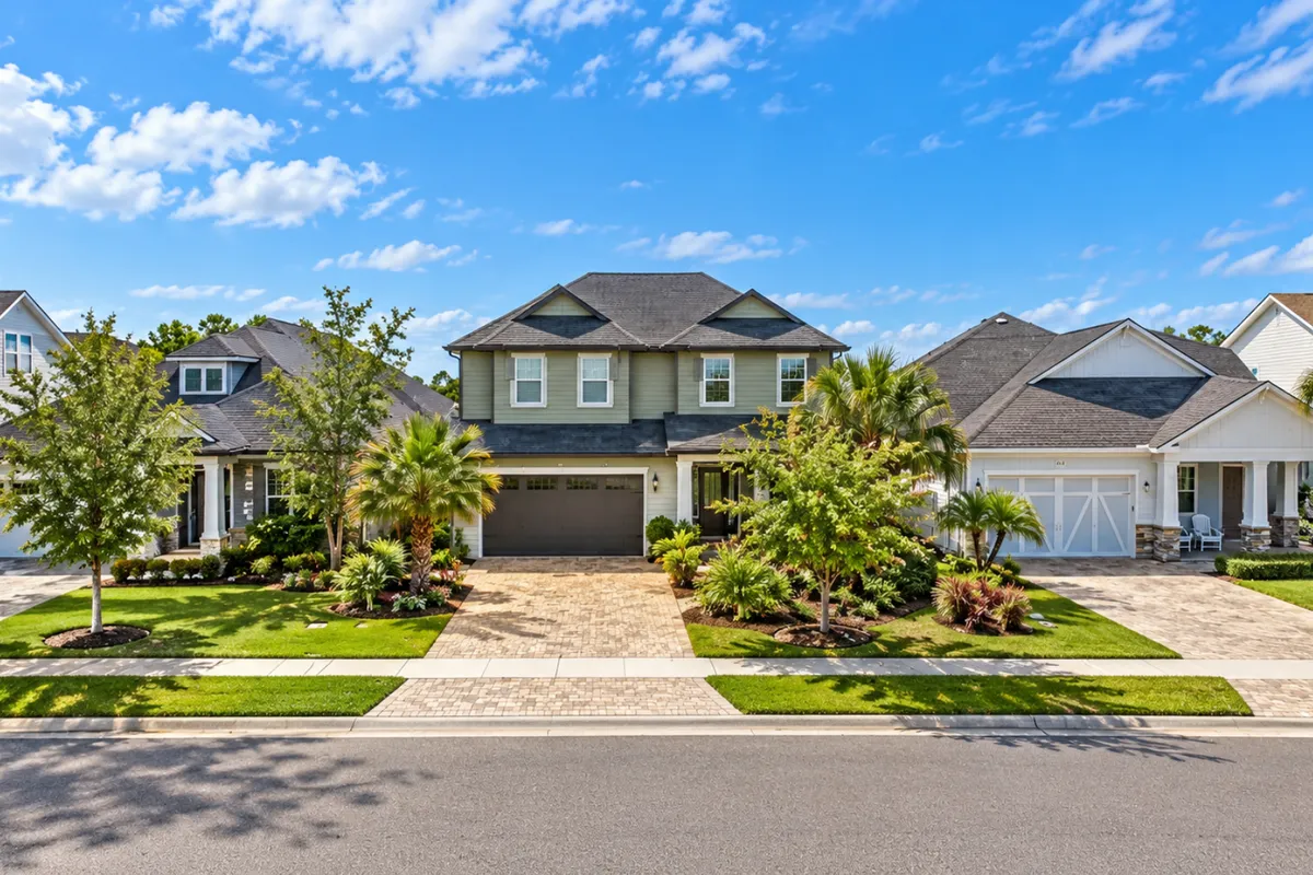 Single-family homes and mature landscaping in The Colony at Twenty Mile in Nocatee