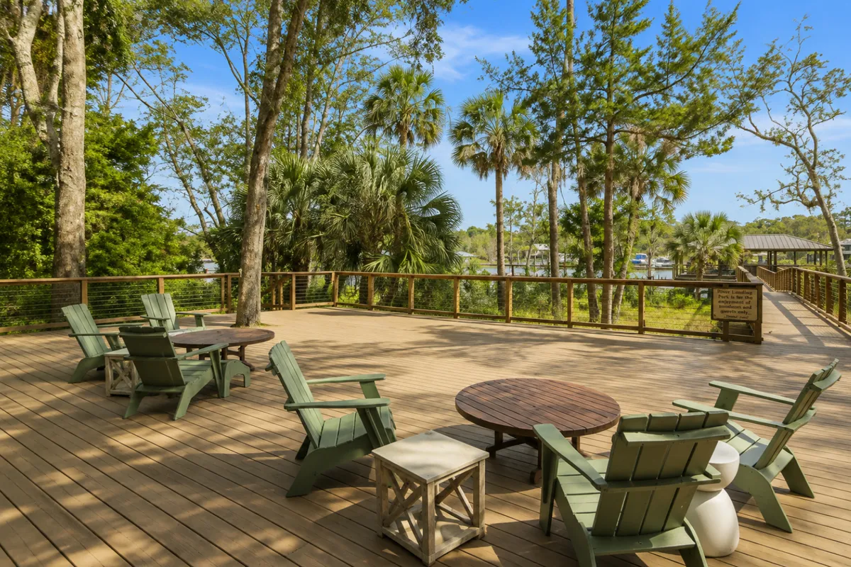 Waterfront deck and seating area at the private River Landing neighborhood park