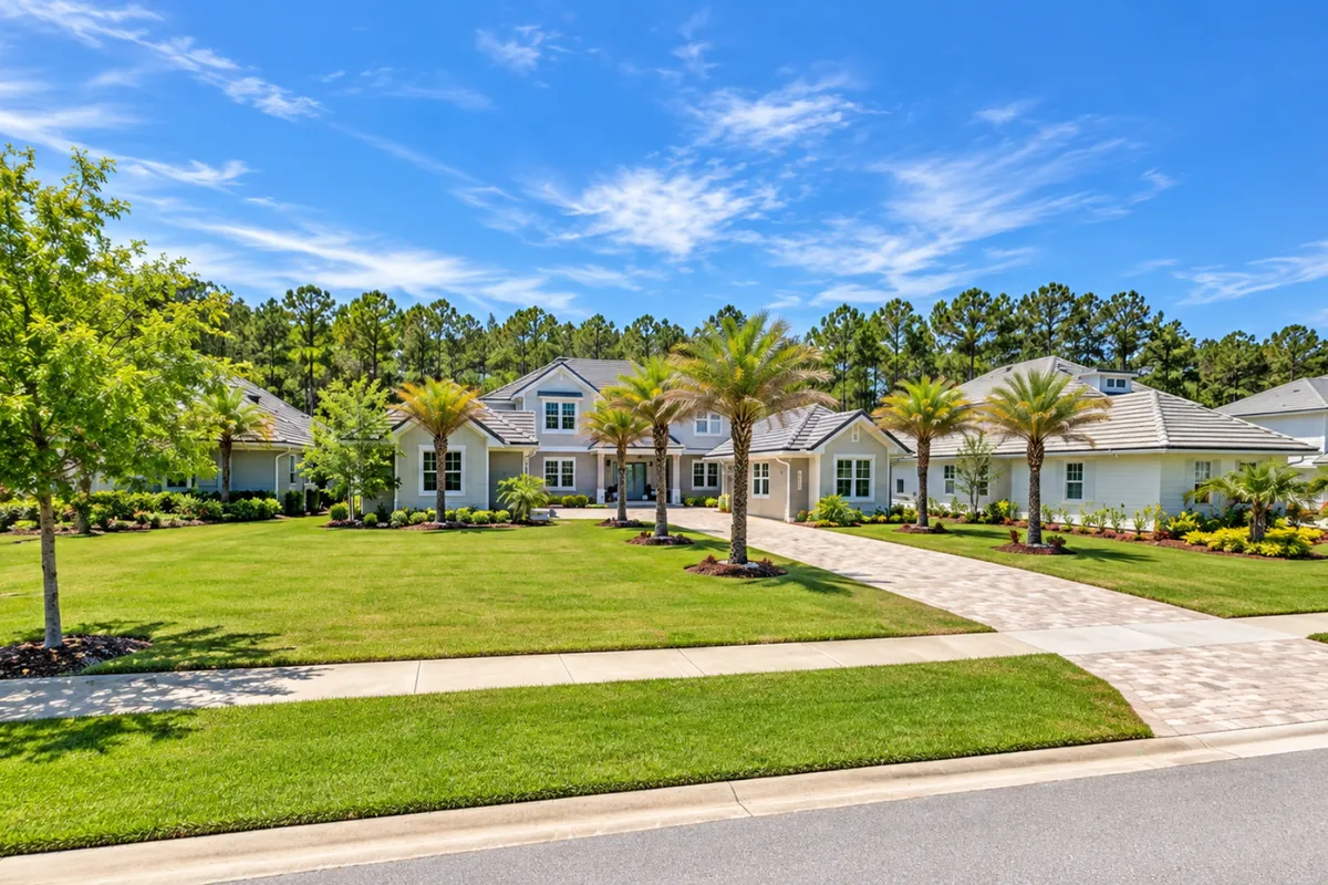 Streetscape in The Hammock at Twenty Mile showing larger custom homes and spacious homesites