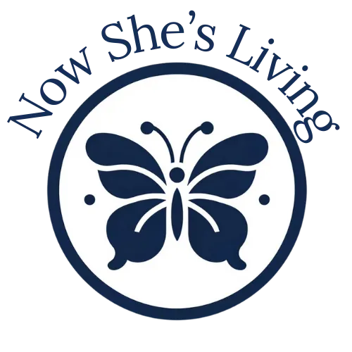 Now She's Living Brand Logo. A blue butterfly inside a circle with the name Now She's Living above it. 