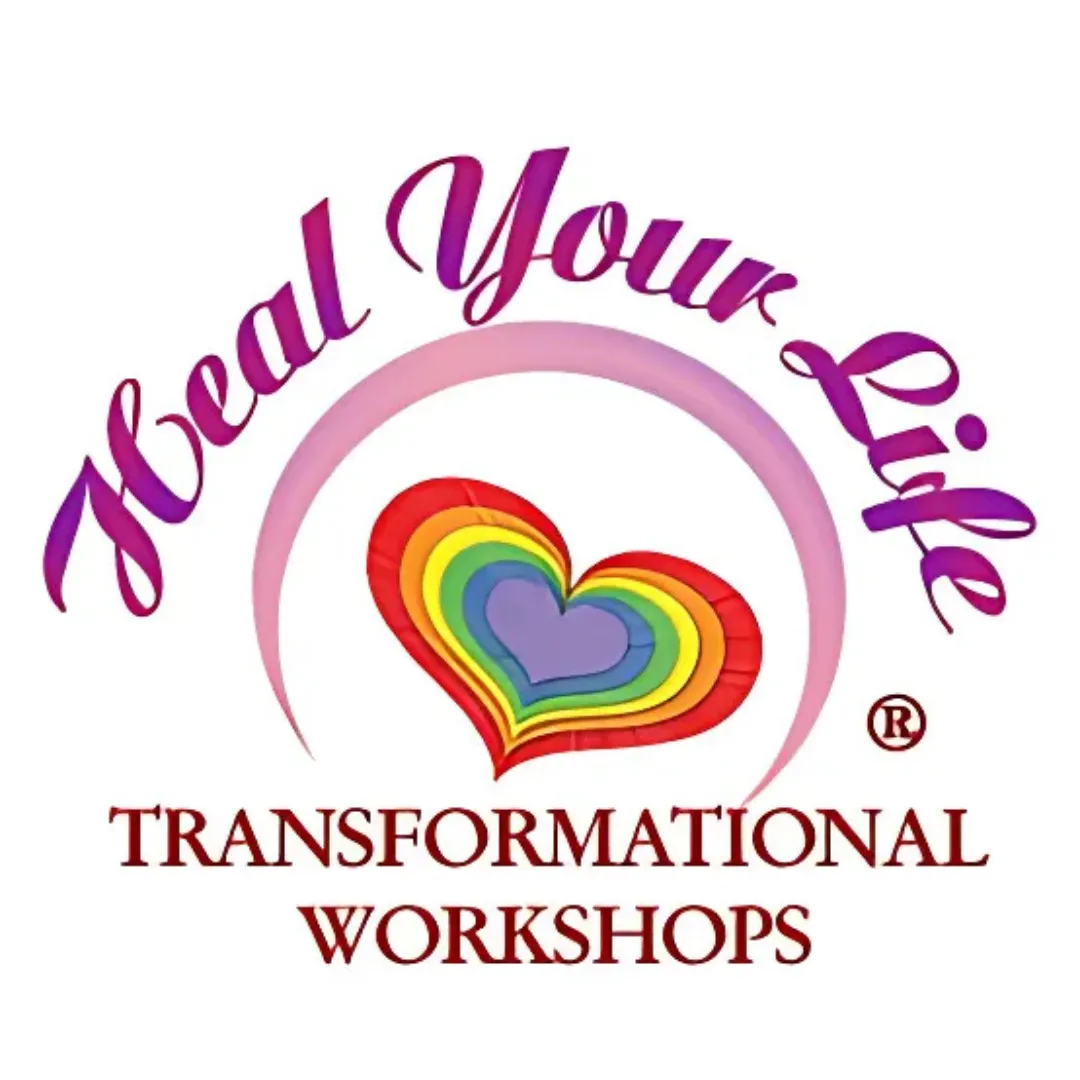 The Heal Your Life logo featuring bold, flowing purple script for 'Heal Your Life,' with a curved pink arc and a rainbow-colored heart at the center. Below, the text reads 'Transformational Workshops' in red serif font, emphasizing personal growth and healing.