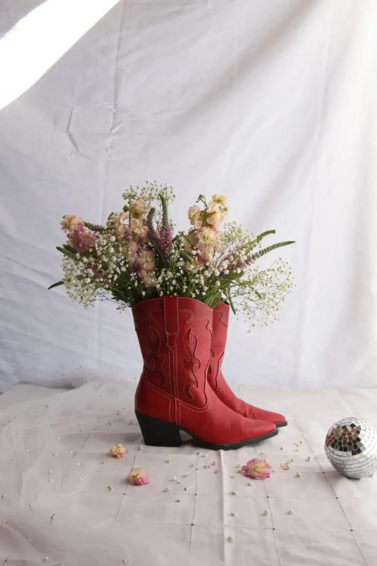 Red boots filled with flowers