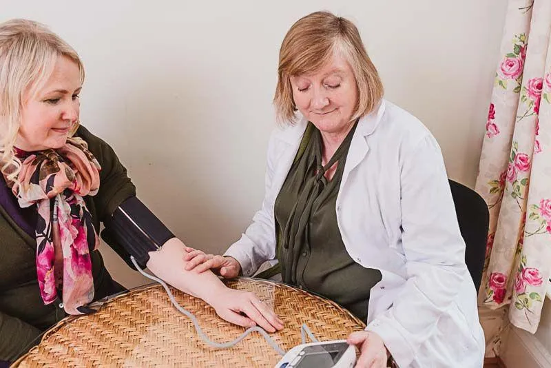 marie with patient in consultation