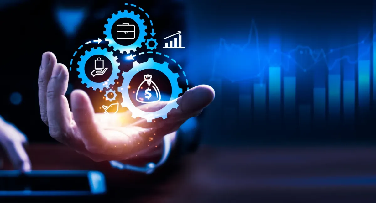 Hand holding digital icons representing tools to scale your business