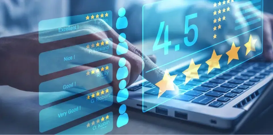Hand interacting with laptop keyboard displaying 4.5-star rating and glowing customer reviews, emphasizing reputation management and online presence enhancement.