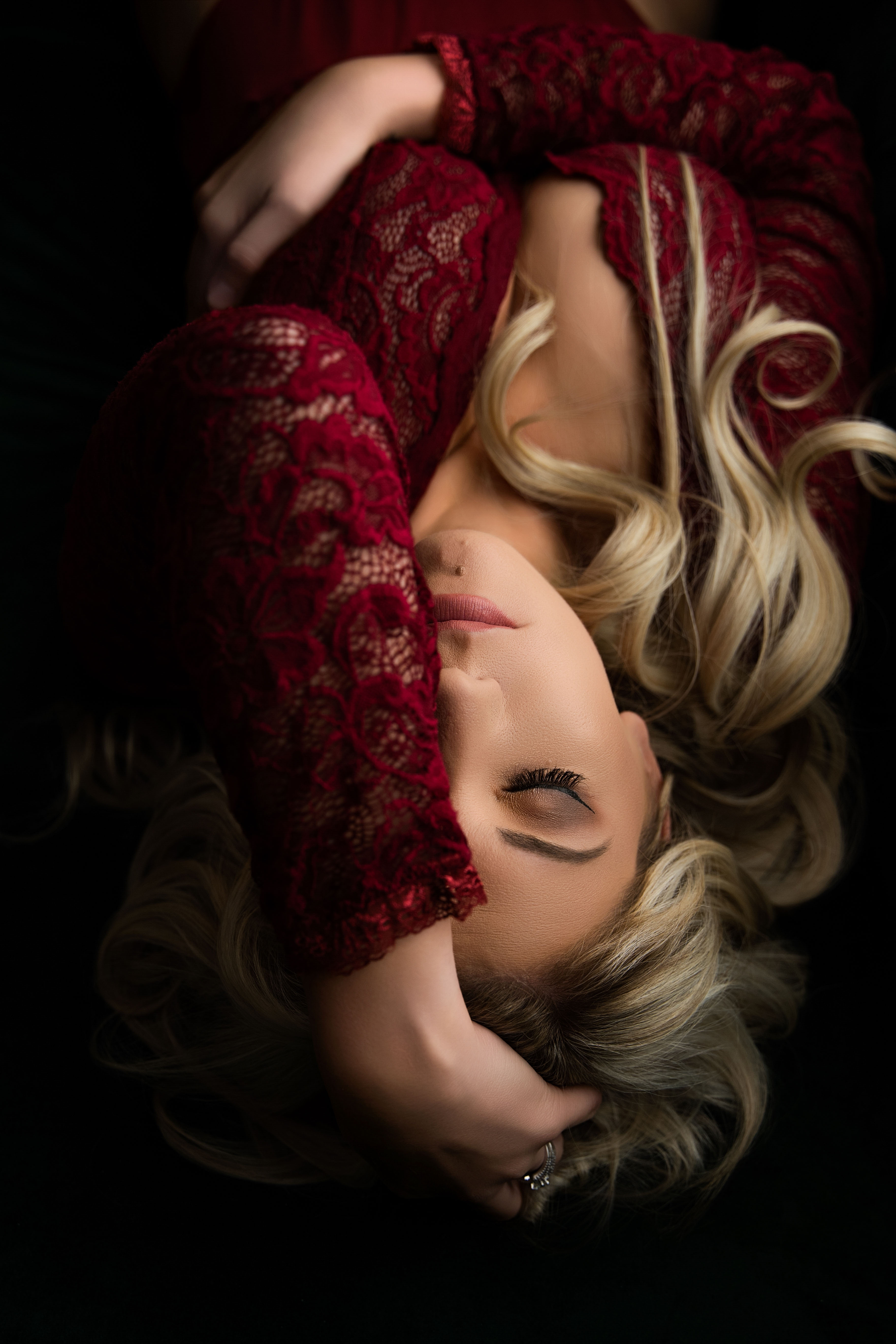Luxury boudoir portrait woman in lace red long sleeves Jen Loyer Boudoir Prescott AZ
