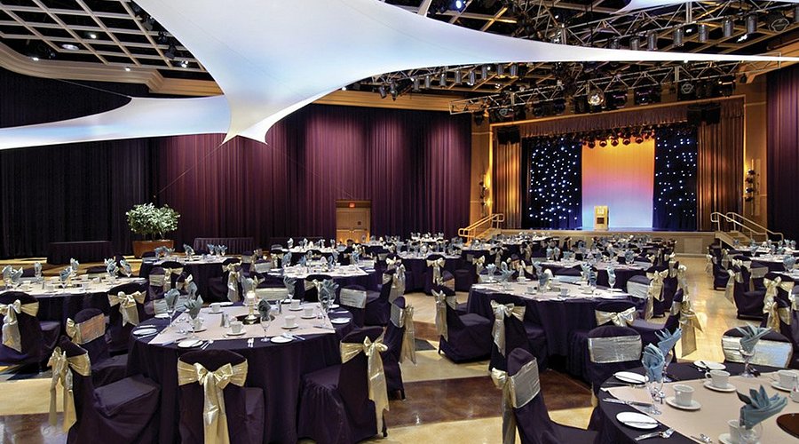 silhouette of people standing on mirror during golden hour