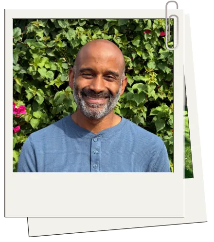 Chris, therapist at The Rosemary Tree, headshot in a photo frame.
