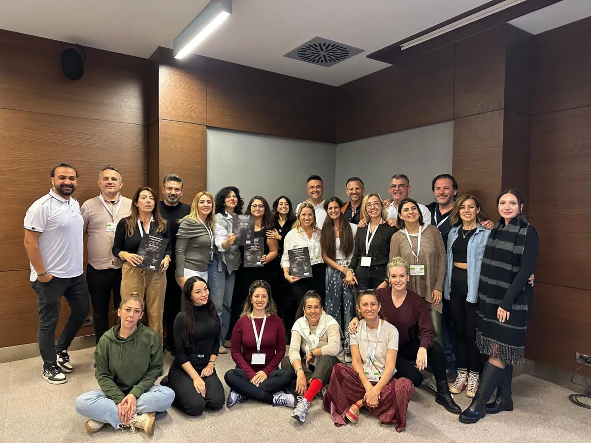 a body of water with mountains in the background