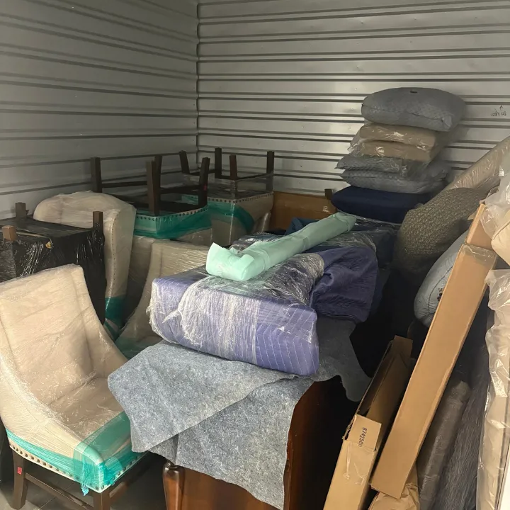 Wrapped furniture and contents in secure storage during a Phoenix restoration pack out