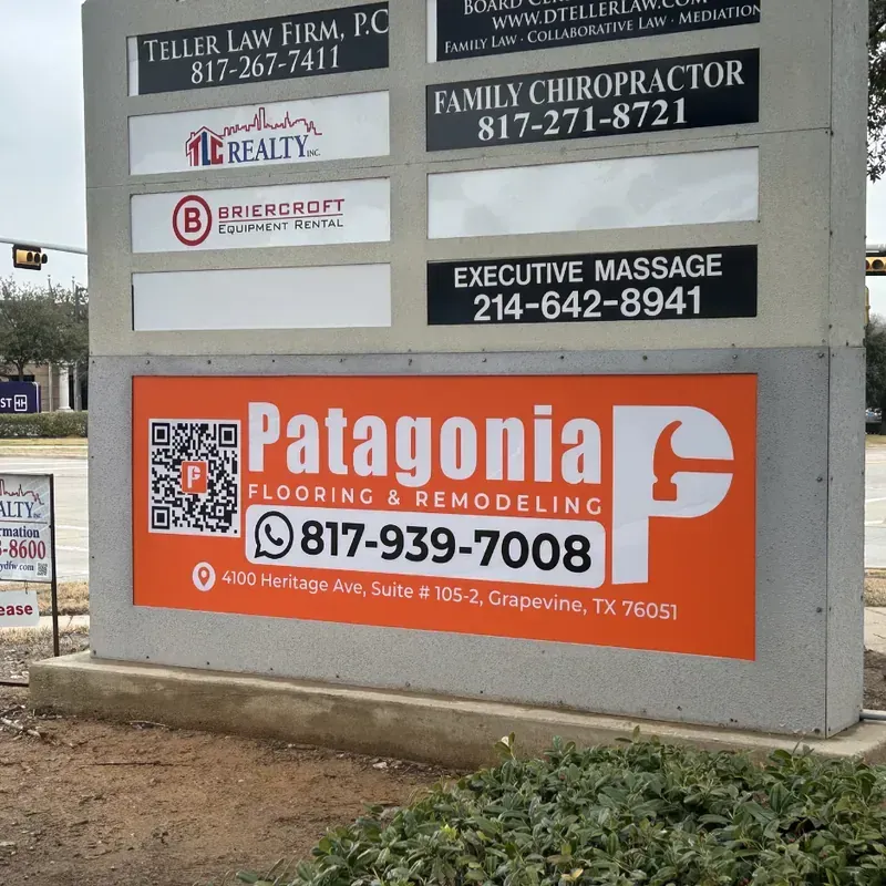 Large multi-tenant pylon monument sign in Grapevine, Texas, featuring Patagonia Flooring and Tiller Law Firm