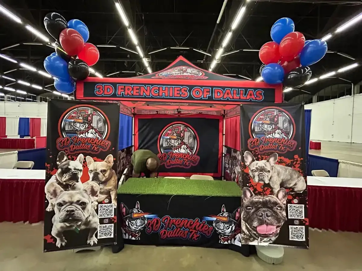 Complete patriotic-themed tradeshow booth with a branded canopy, custom banners, and balloons