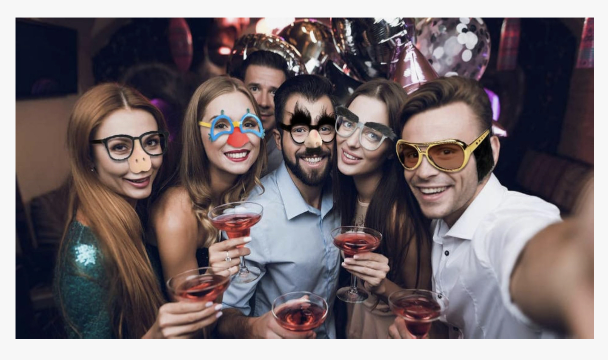 Fun photo booth group selfie at luxury private event
