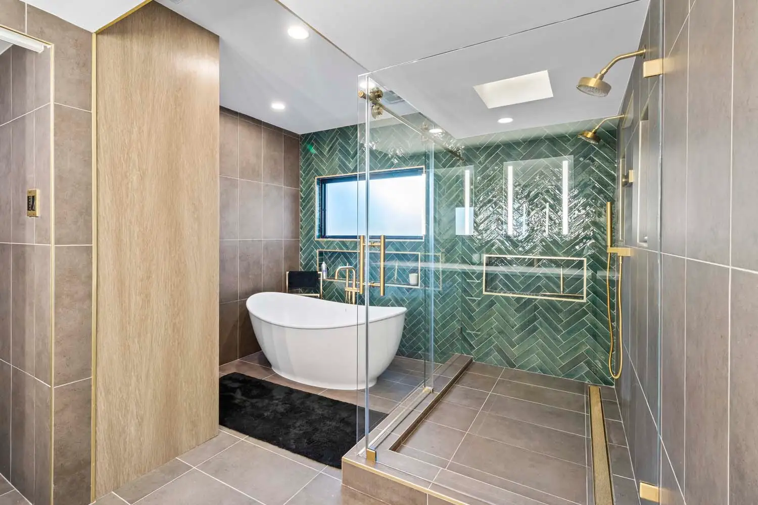 Finished basement retreat with lounge seating and warm layered lighting.