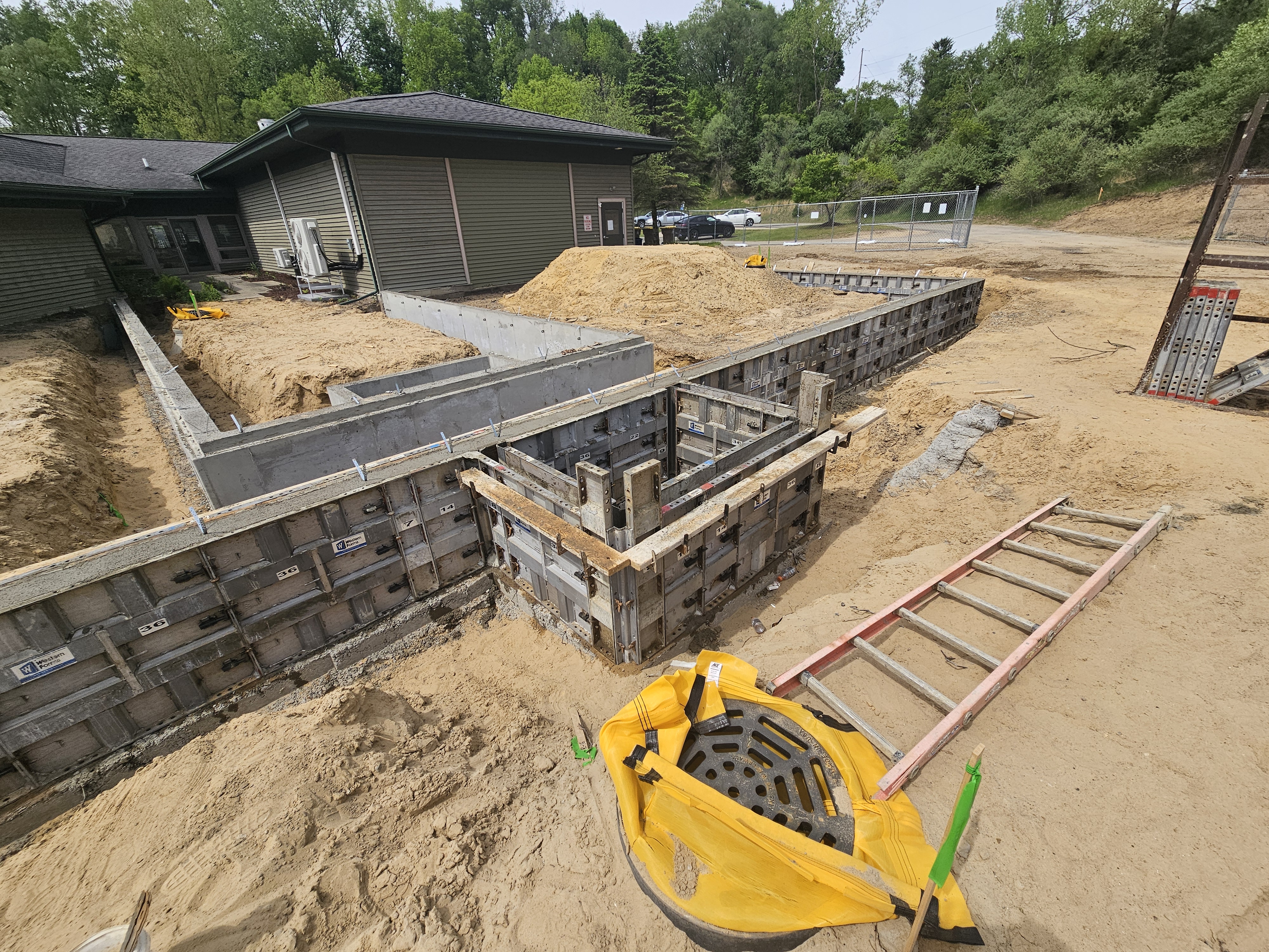 Reinforced concrete foundation walls under construction at a commercial site
