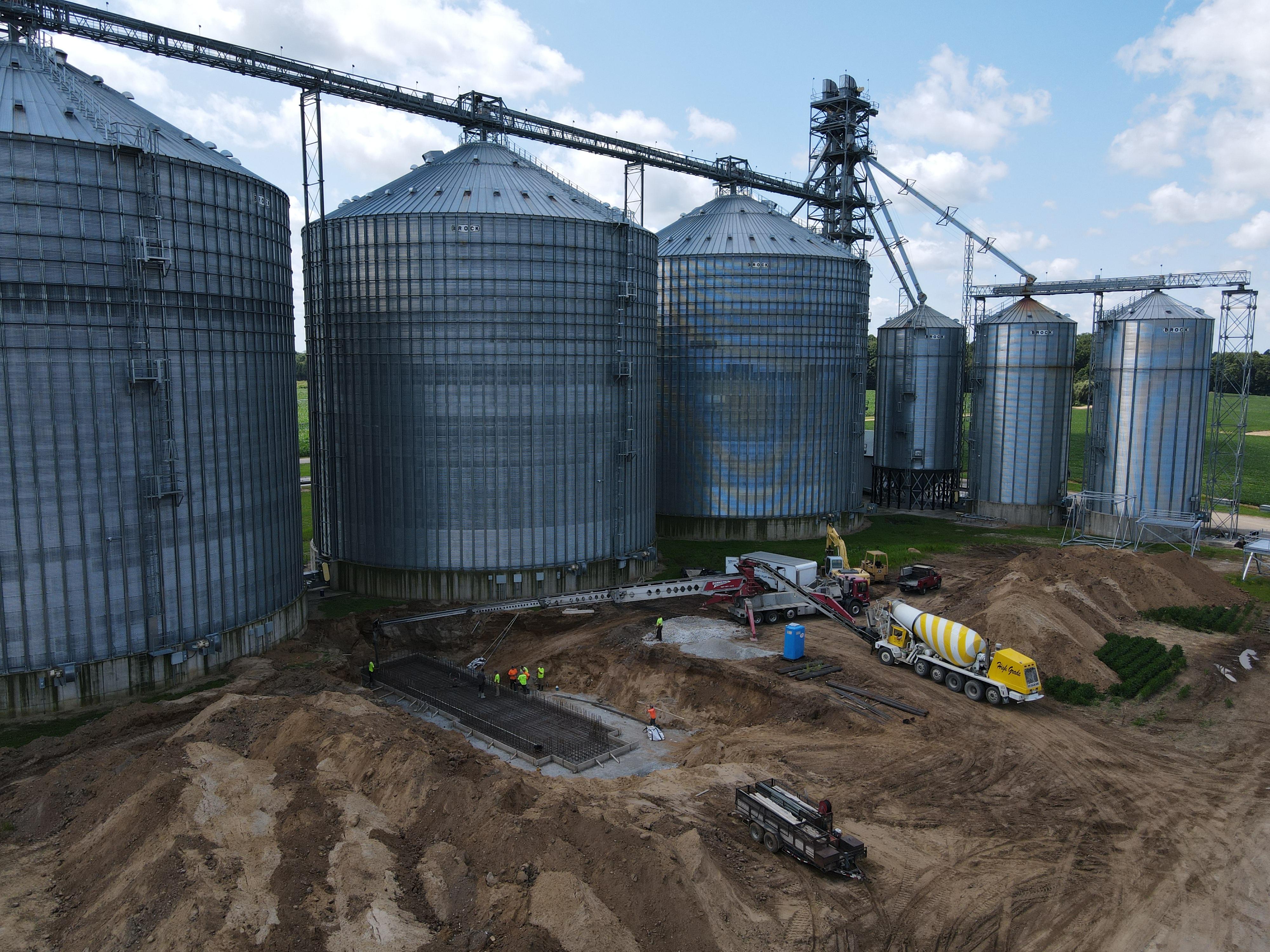 Large agricultural concrete project with crew on site