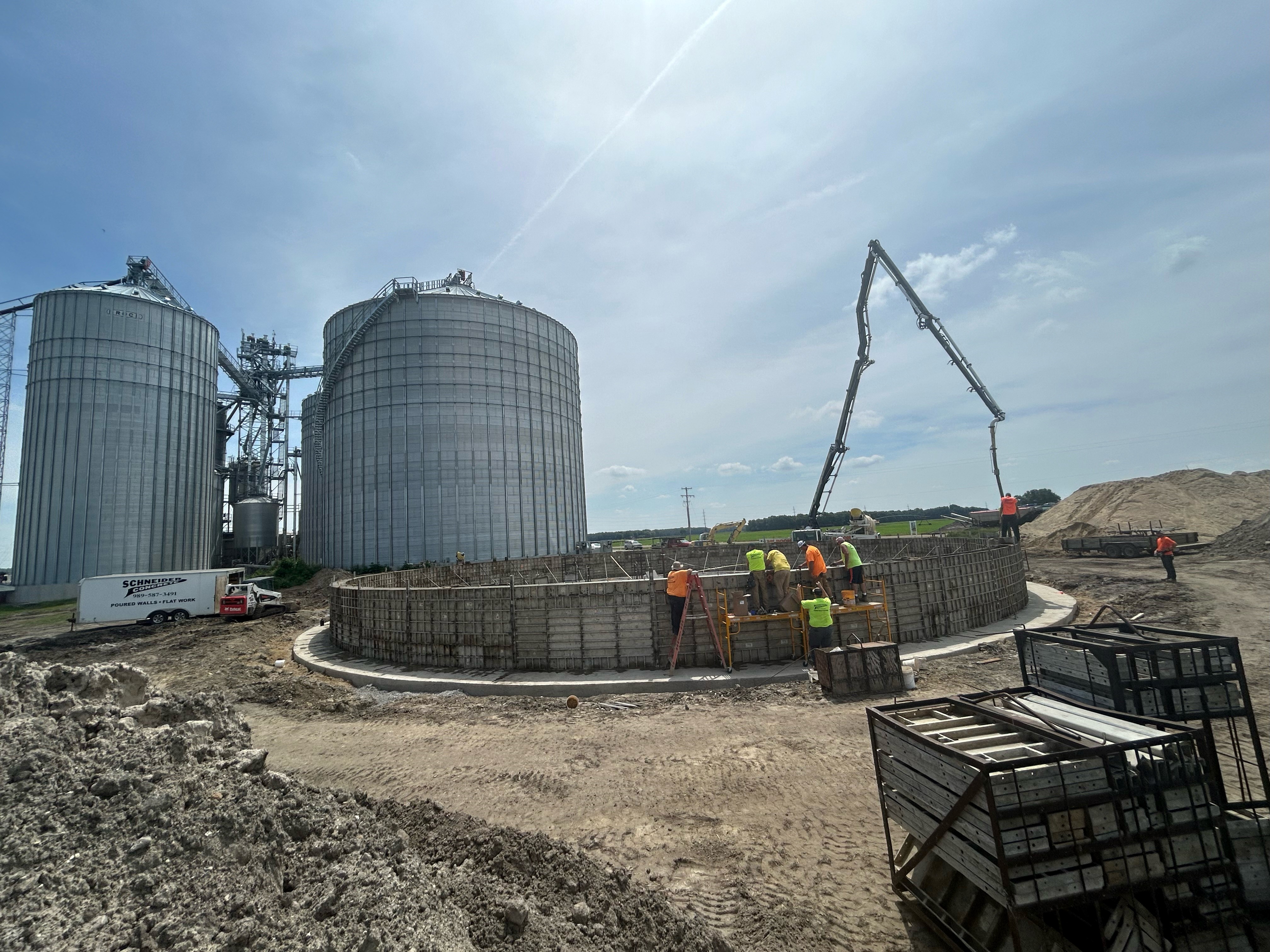Crew working on a large-scale agricultural concrete project