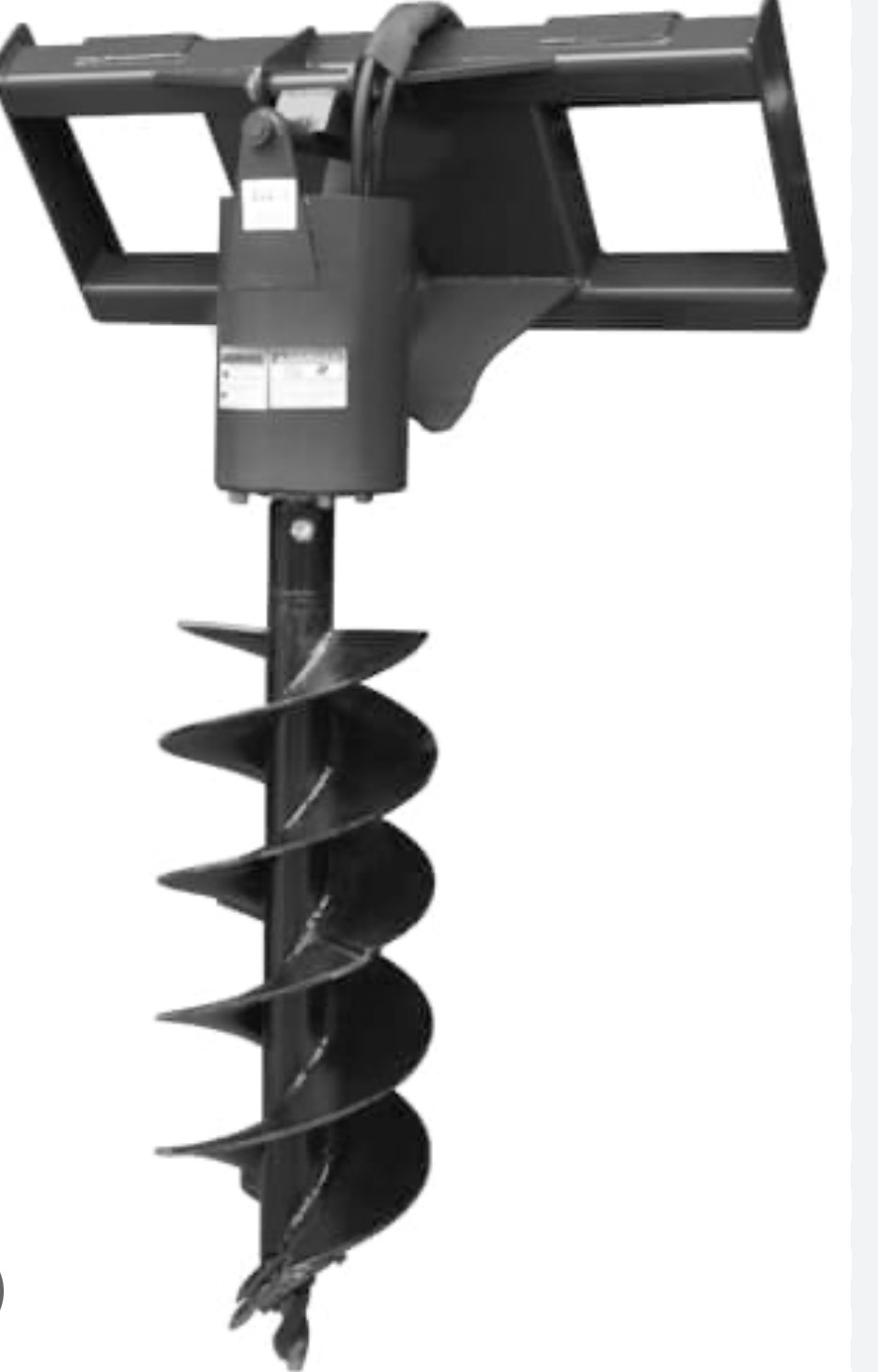 A large excavator and compact loader parked on a construction site at sunrise, with safety cones and freshly moved earth in the background. The equipment is clean and well-maintained.