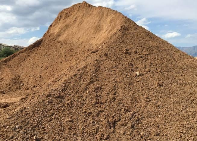 Screened fill dirt ready for site backfill and grading