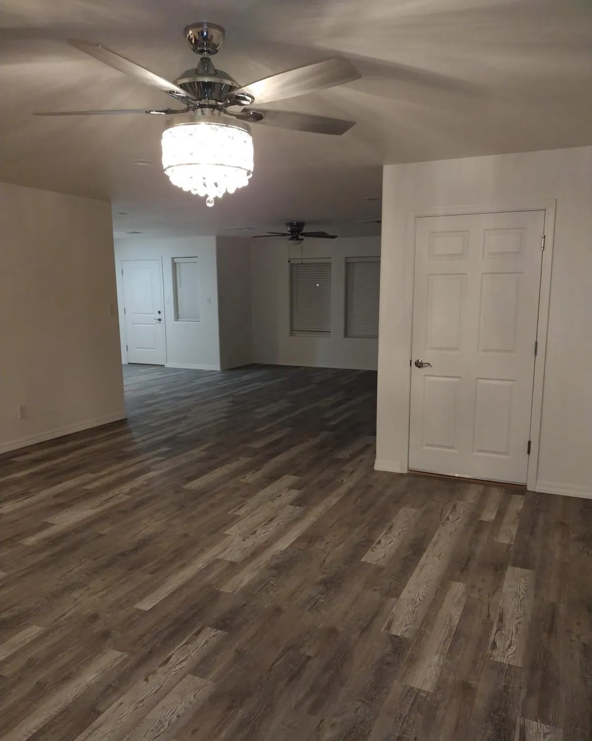 An empty room with cool wooden flooring